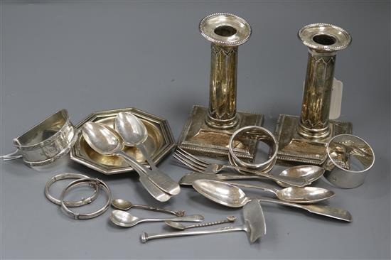 Sundry small silver and white metal items, including a pair of dwarf candlesticks, a Christofle dish, three napkin rings, spoons, etc.